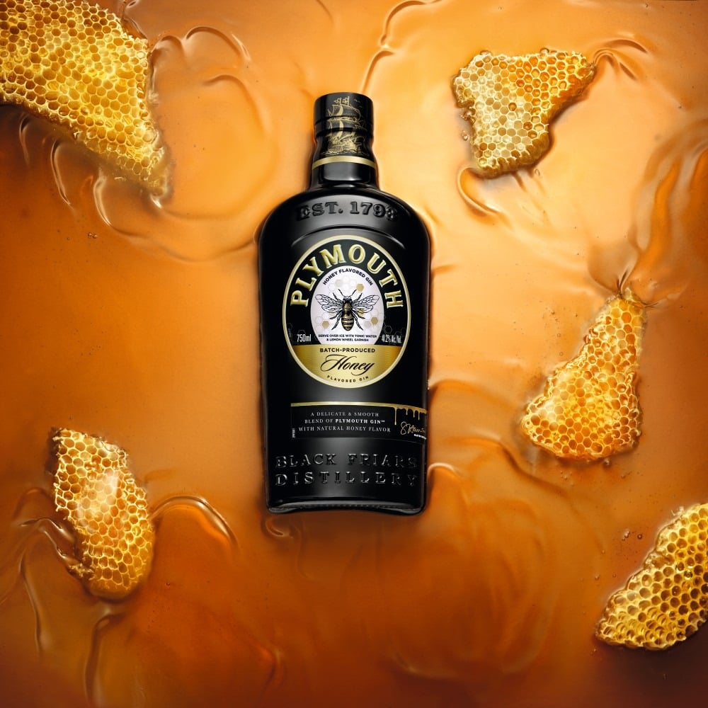plymouth honey bottle with honey background